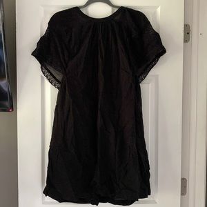 Black dress with embroidered sleeves